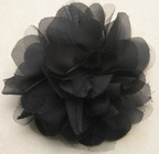 Black artificial chiffon and mesh artificial flower corsage with pin